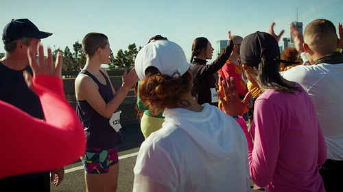 Runners celebrate success with high fives