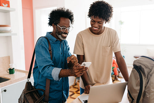 A happy father and son: Morning routine and technology