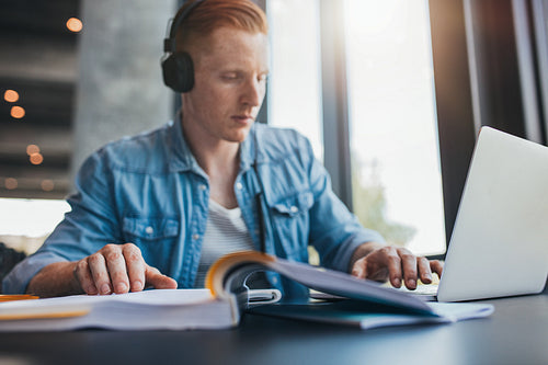 Student studying in library at university