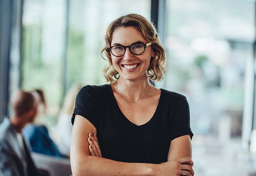 Portrait of successful female professional in office