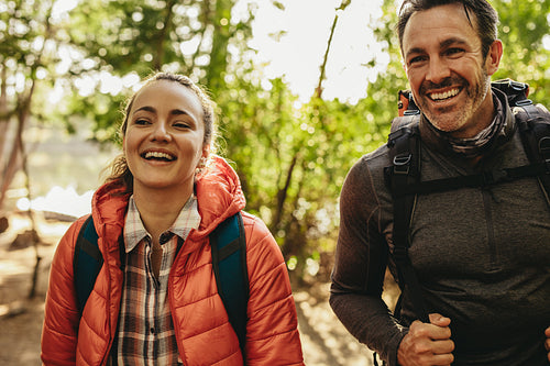 Happy couple on a weekend camping trip