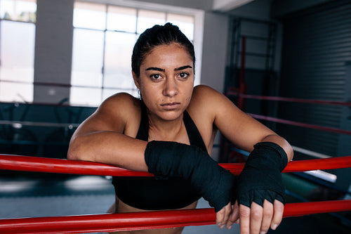 Female boxer inside a boxing ring