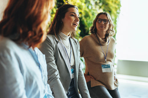 Dynamic collaboration: Professional women engaged in empowering discussion