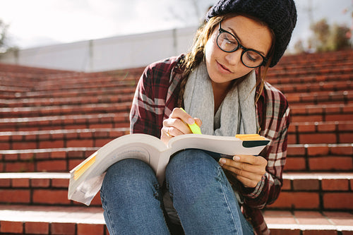 Woman studying at university campus