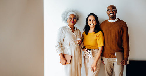 Group of business professionals posing together