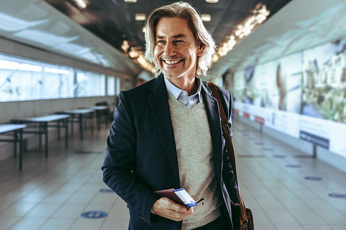 Business traveler walking to the boarding gate at airport
