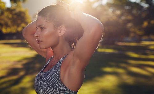 Tough young woman getting ready for training.