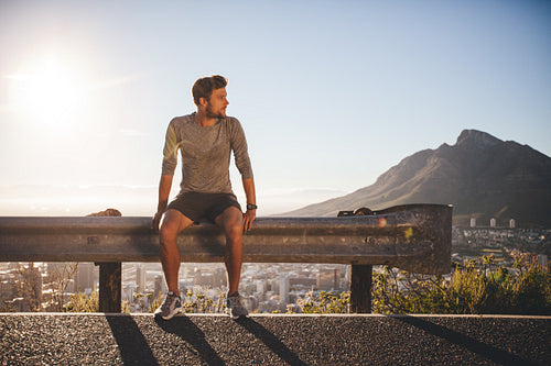 Man taking a break after morning run