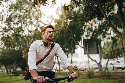 Businessman riding a bicycle
