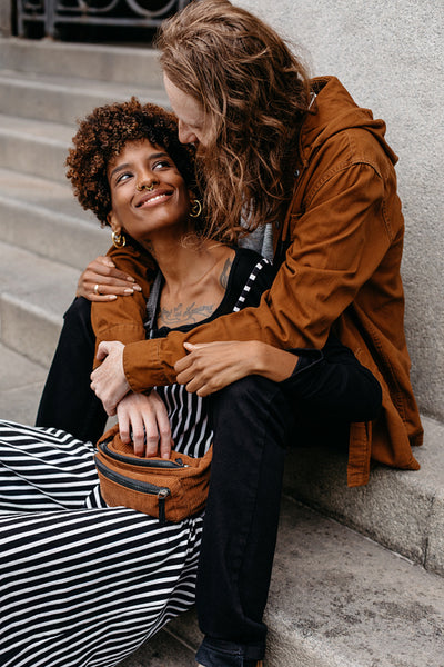 Affectionate embrace on city steps, love and connection outdoors