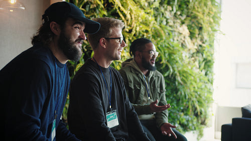 Business men clapping hands in a conference meeting