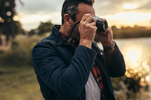 Tourist taking photos of nature
