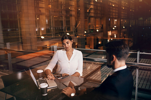 Business people waiting at airport lounge with laptop