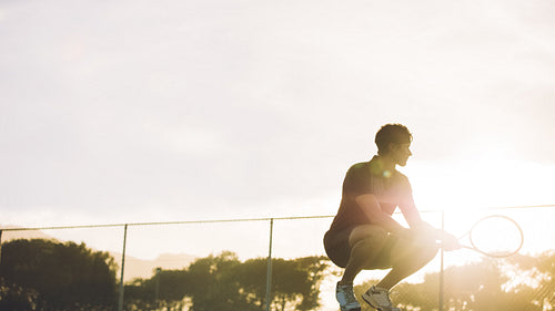Professional tennis player resting between games