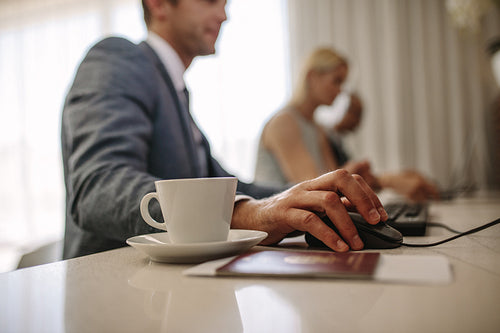 People at cyber cafe inside airport terminal
