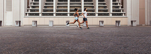Man and woman running in the morning