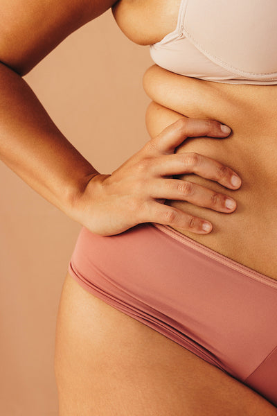 Curvy female body in underwear