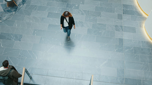 Overview of daily activities on a college campus, showing students and lecturers going about their day