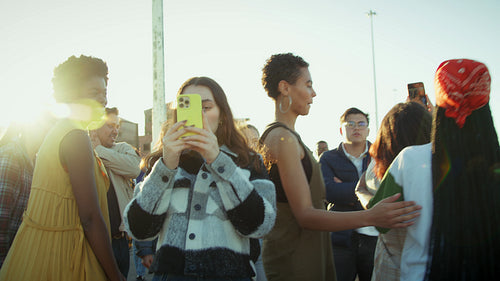 Young people at a public gathering