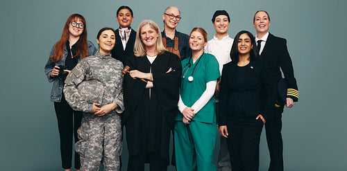 Happy female profesionals smiling in a studio