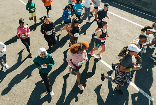 Diverse group of runners in a vibrant outdoor race