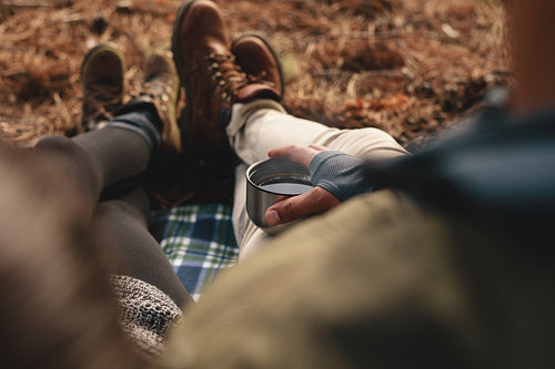Hiker couple sitting together outdoors