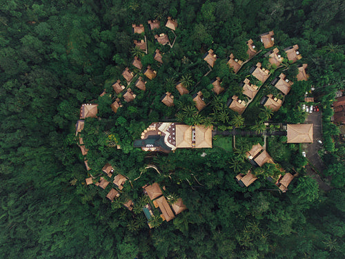 Luxury resort in rain forest surrounded by greenery