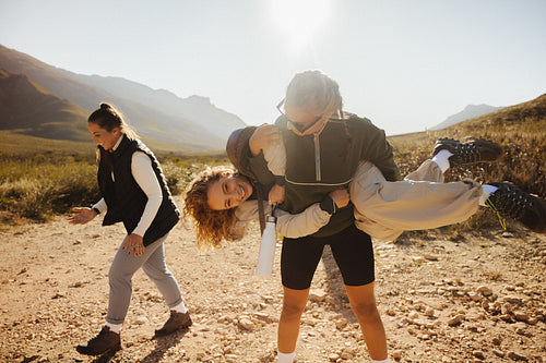 Friends hiking and playing outdoors
