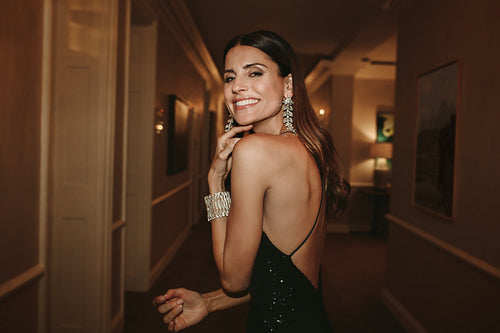 Attractive woman in elegant evening gown