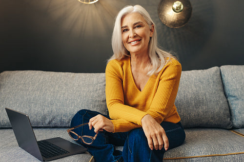 Working from home: Senior woman enjoying the benefits of remote work