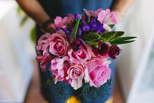 Flower bouquet in hands of florist