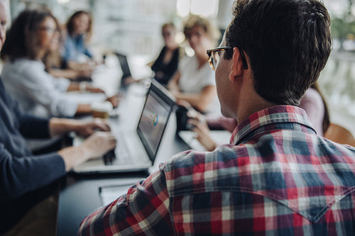 Man sitting in office meeting
