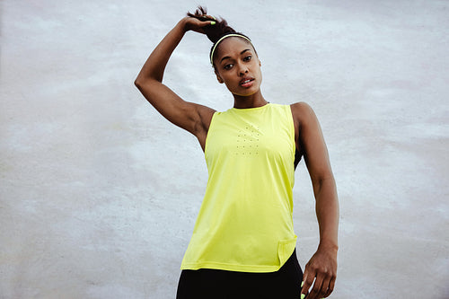 African fitness woman looking at camera