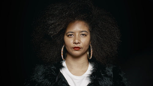  Mature woman with afro hairstyle