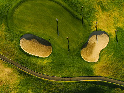 Aerial view of beautiful golf course with players