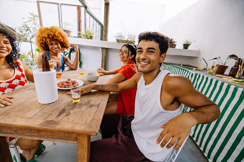 Group of friends enjoying a summer day at a casual gathering