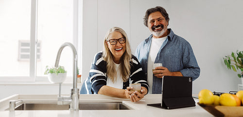 Woman shares coffee with her couple partner at home