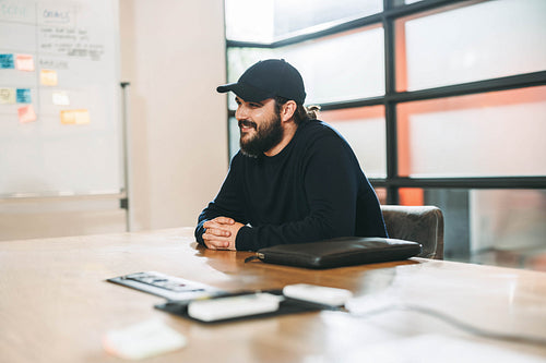 Professional businessman leading creative discussion in a modern office