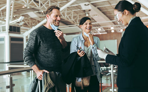 Couple boarding flight during pandemic