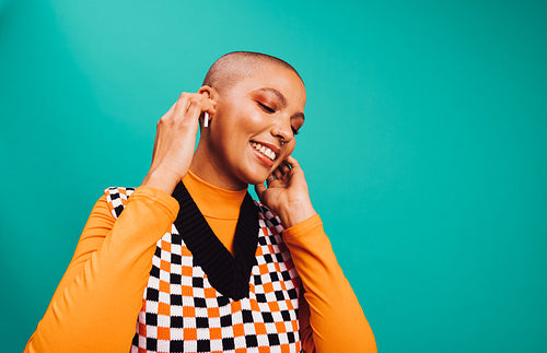 Woman listening to happy music