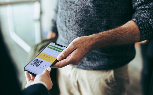 Covid-19 vaccine passport checking at airport
