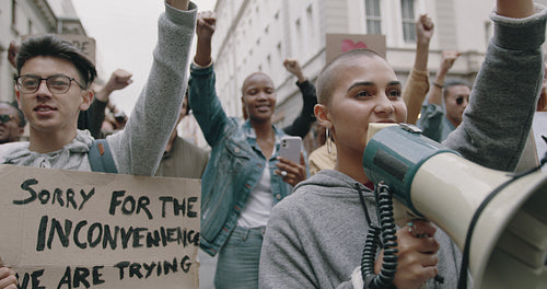 Group of people protesting on the street