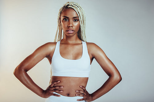 Close up of african american fit woman on white background