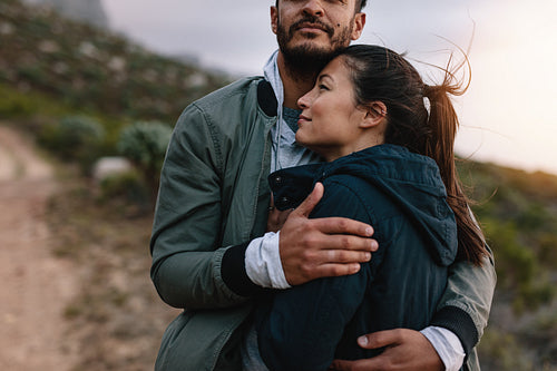 Loving young couple in countryside