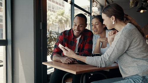 Best friends hanging out at a coffee shop