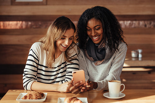 Friends sitting in a cafe