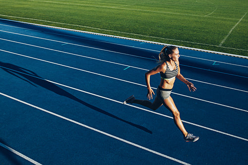Female sprinter training for race competition