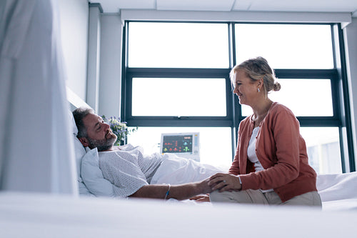 Woman visiting husband in hospital