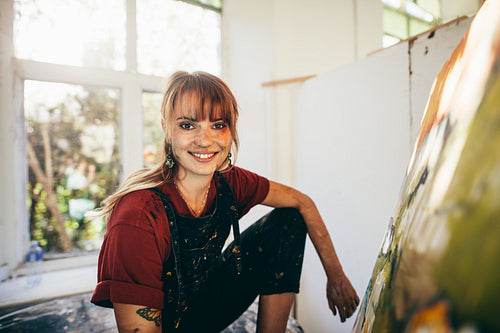 Professional female painter in her studio