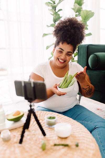 Woman vlogging tips for skin care
